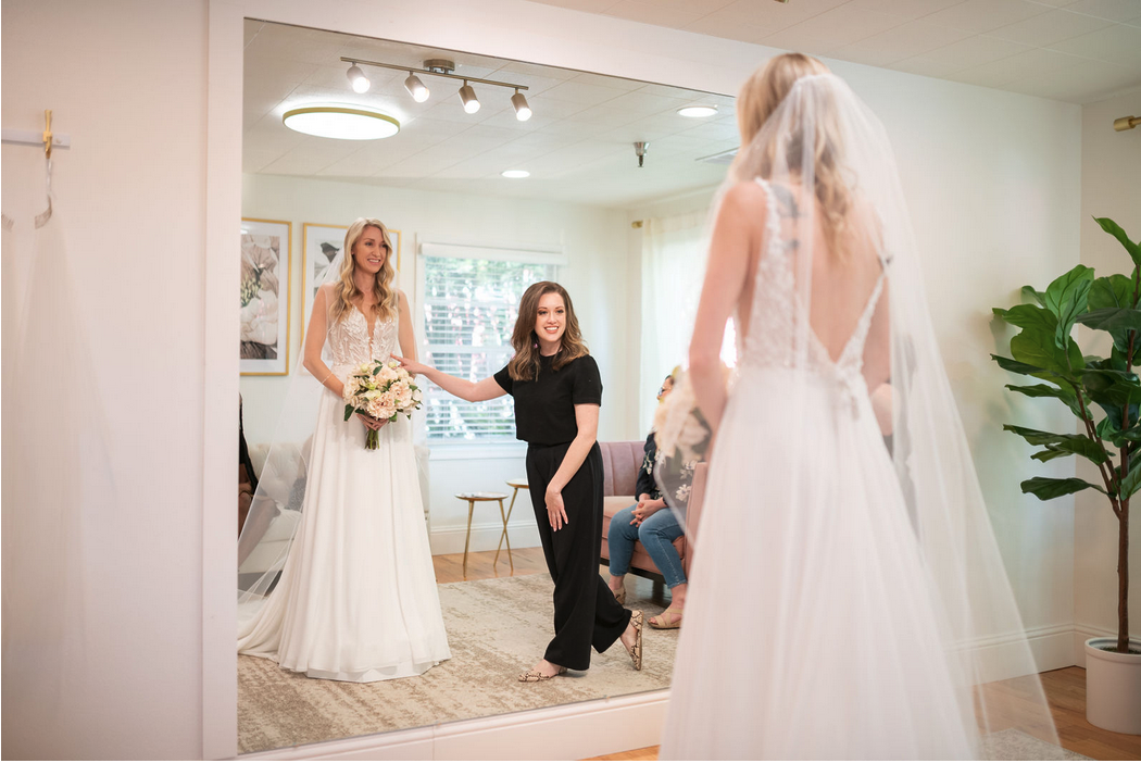 Charlotte's Weddings bridal stylist and a bride