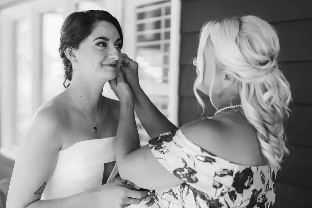 Bride getting ready black and white photo